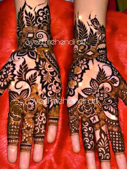 A classic party-wear design with a mix of florals and paisleys.