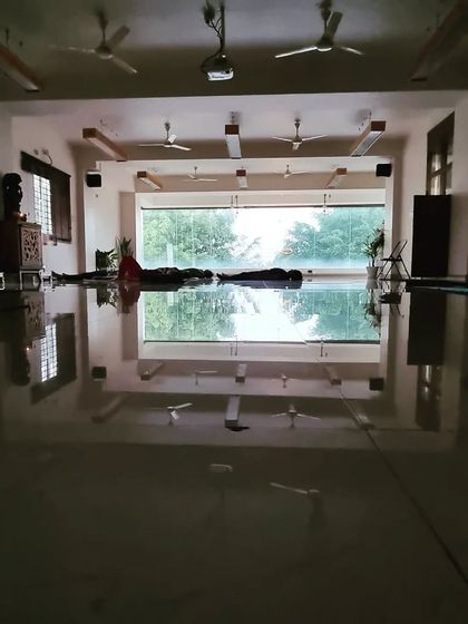 It is a blessing to be in stillness and practice yoga. This photo captures the peace of Savasana (corpse pose) after a vigorous practice.