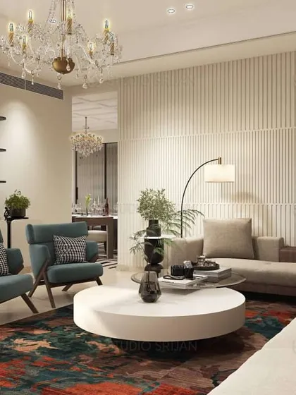 This angle shows the open-plan layout, with a glimpse into the adjoining dining area. I used a mix of seating, including armchairs and a large sectional, to create a versatile space for both large gatherings and intimate conversations.