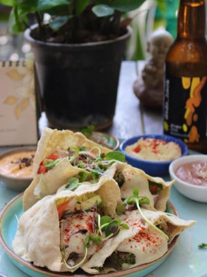 Enjoy our Pita Platter with a bottle of kombucha for the perfect summer meal. The combination of fresh, flavorful dips and crunchy falafel is irresistible.