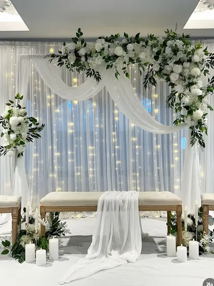 I design clean and elegant setups perfect for a Nikkah, Roka, or minimalist wedding. This all-white theme with soft lighting and delicate florals creates a timeless and graceful look.