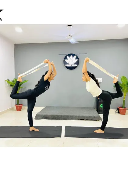Using a yoga strap to deepen the Natarajasana, or Lord of the Dance Pose. Props are wonderful tools for beginners and advanced students alike, helping to improve flexibility and achieve poses with correct alignment.