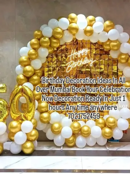 Celebrating a big milestone? I design elegant decorations for landmark birthdays like this 50th celebration. The classic gold and white balloon arch, foil numbers, and neon sign create a sophisticated look for the occasion.