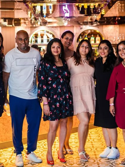 A group photo with regulars. I love seeing familiar faces and building a community around my music.