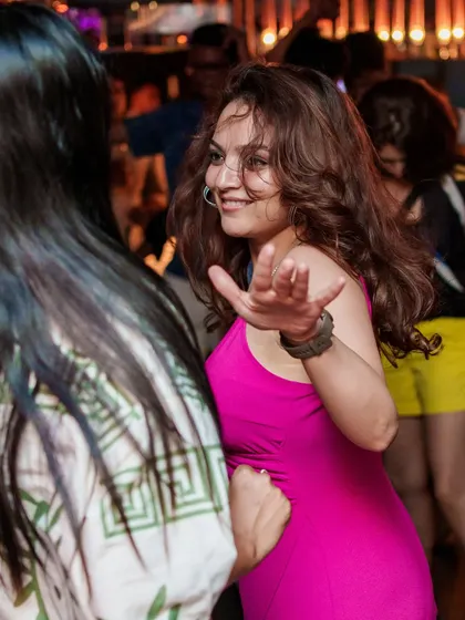 A guest dancing and feeling the music at Kaze on a Saturday night. The rooftop vibes are unmatched.