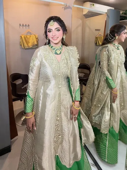 A full-length view of this unique and elegant outfit, complemented by our makeup and hair styling.