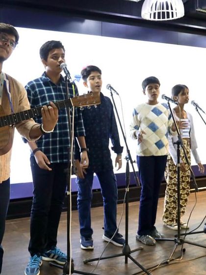 Our Gully Choir students performing at an SBI Card event. This was a proud moment for us, as our children shared their music to support an initiative for educational scholarships.