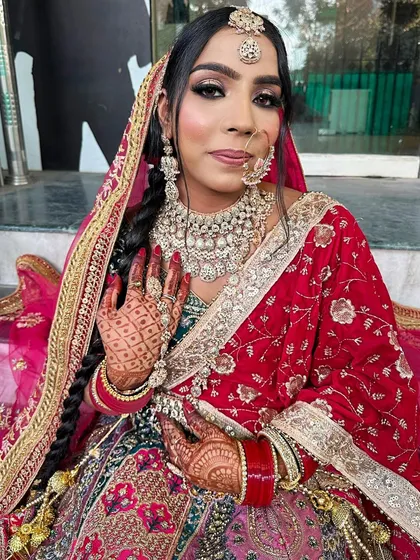 A close up of the bridal makeup, highlighting the flawless skin and intricate eye work.