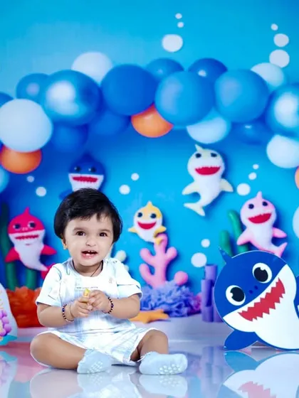 A full view of the adorable Baby Shark setup, with our little model sitting happily in the center.