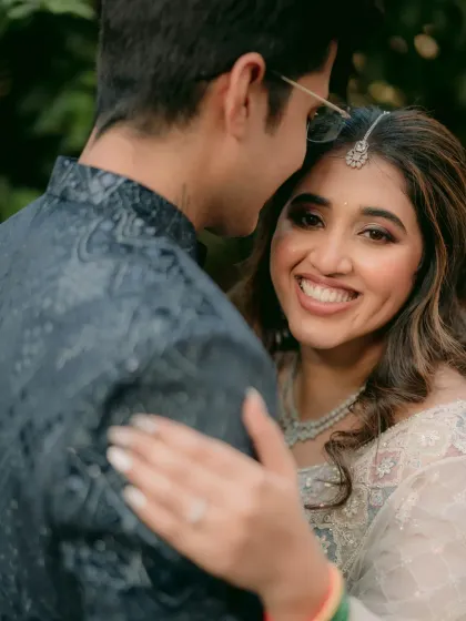 That smile says it all. This close-up shows how the natural-finish foundation and soft contouring enhance her features without masking her beautiful skin.