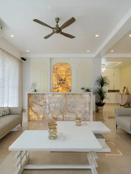 An open, flowing layout is key to modern luxury. In this living space, I used a backlit onyx bar and soft, neutral furnishings to create an atmosphere that is both grand and welcoming. The design focuses on seamless transitions and an abundance of natural light to make the home feel both functional and breathtaking.