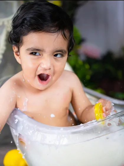 The pure joy of splashing around. Milk bath sessions are not only beautiful but also incredibly fun for the little ones.