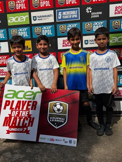 Our youngest footballers, the U7s, showing off their Player of the Match awards at the DPDL.