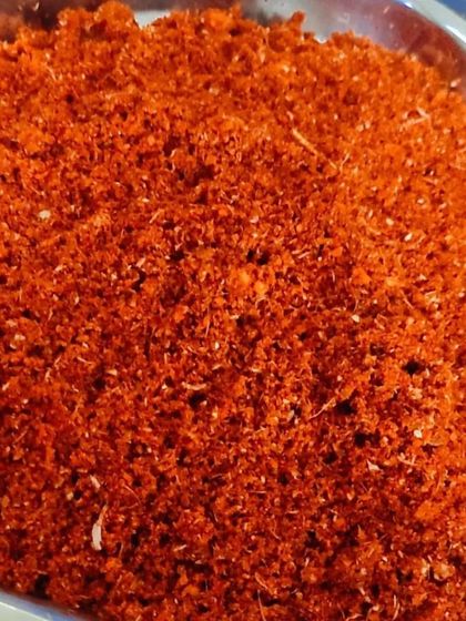 A close-up of my freshly made Kobbari Karam (coconut spice powder). This podi is a perfect mix of dry coconut, Guntur chillies, and spices, ideal for sprinkling on hot rice with a dollop of ghee.