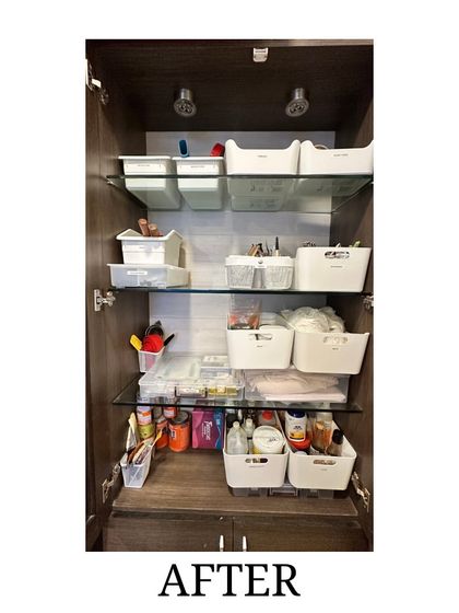 After: The same art supply cabinet, now perfectly organized with white bins. We categorized everything, making the space functional and inspiring.