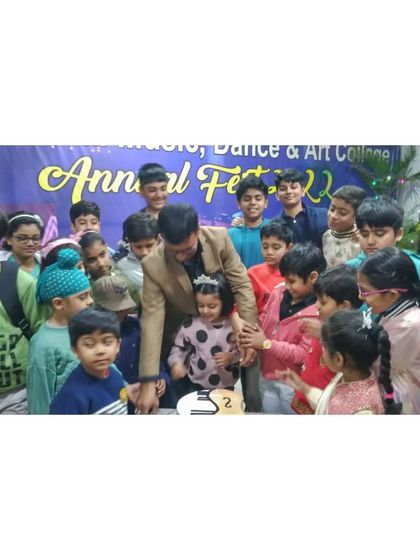 Our founder, Vinit Kumar, celebrating with young students during the Annual Fest cake cutting ceremony. It is a joy to see the excitement and camaraderie among our budding musicians.