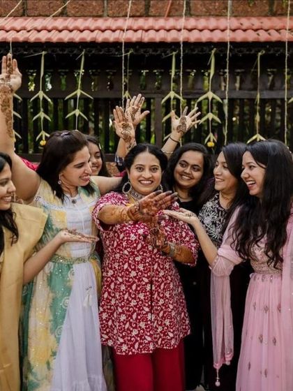 The bride surrounded by her happy bridesmaids, all showing off their beautiful henna. These are the moments that make my work so special.