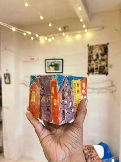 These bright, colorful pieces perfectly reflect the student's sunny personality. From hand-built forms to glazing without fear, she really let herself explore and enjoy the process during her beginner's course.
