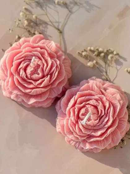 A close-up of the pink peony candles. The intricate petal details are what make these so special.