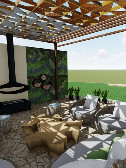 A cozy and stylish covered patio design featuring comfortable wicker seating, a modern suspended fireplace, and vertical garden walls. The patterned pergola provides dappled sunlight, creating a perfect all-weather outdoor lounge.