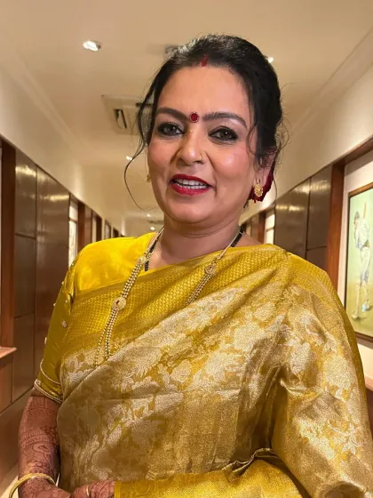 It's an honor to get the mother of the groom ready for the big day. My goal is always to create an elegant, graceful, and radiant look that makes her feel as special as she is. This classic look was paired with a beautiful golden saree.