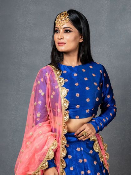 The actor looking stunning in a royal blue lehenga from my designer studio. The makeup, with its defined smokey eye and nude lip, perfectly complements the bold outfit.