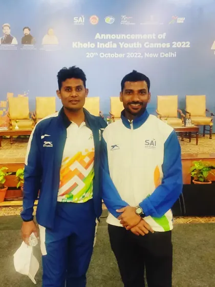 As a SAI-certified coach, I stay connected to the national athletics scene. Here I am at the Khelo India Youth Games 2022 announcement, ensuring my training methods are always up to date with the highest standards.