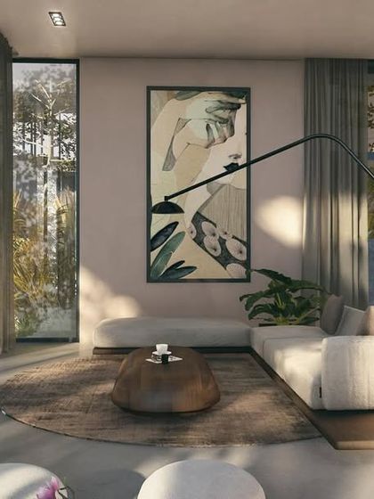 Another view of the Moira Homes living area, showcasing how the space opens directly onto the pool deck. The design uses a neutral, earthy palette to complement the lush tropical landscape visible through the large glass doors.