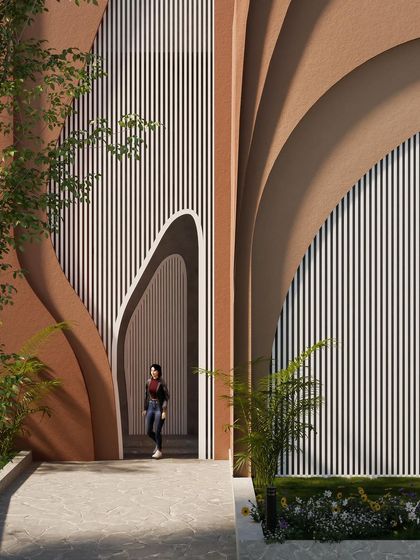 Another view of the sculptural entrance, where the layered forms create a dynamic and welcoming threshold.