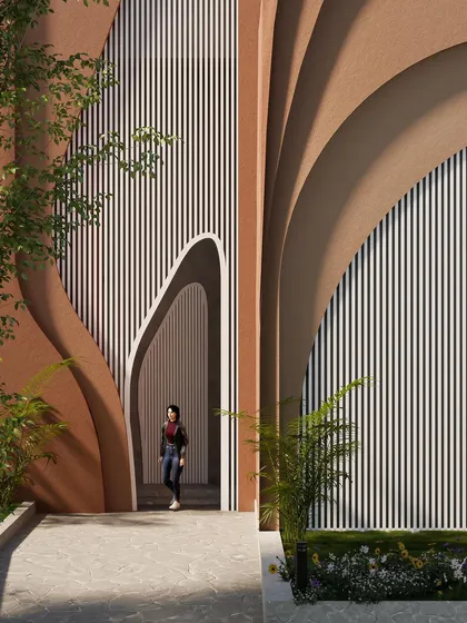 Another view of the sculptural entrance, where the layered forms create a dynamic and welcoming threshold.