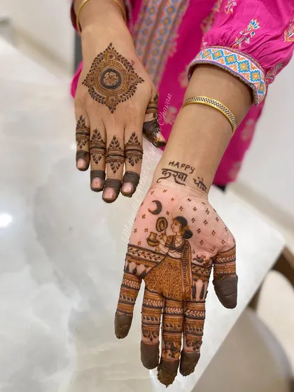 A Karwachauth mehendi with a figure of a woman performing the ritual, along with personalized text. A beautiful way to honor the festival.