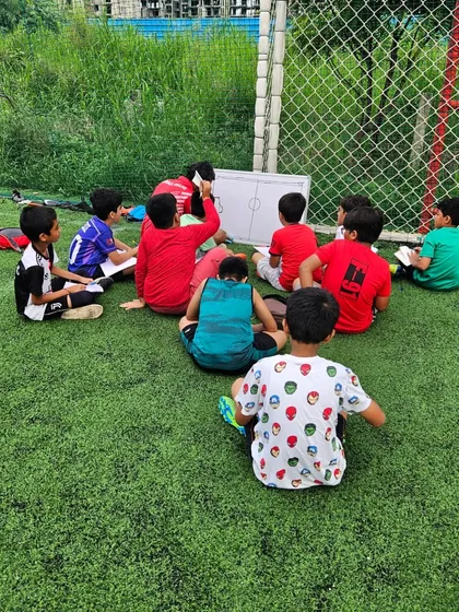 We believe in smart football. Our tactical whiteboard sessions are a key part of our youth football coaching, helping players understand formations, positioning, and game strategy before they step on the field.