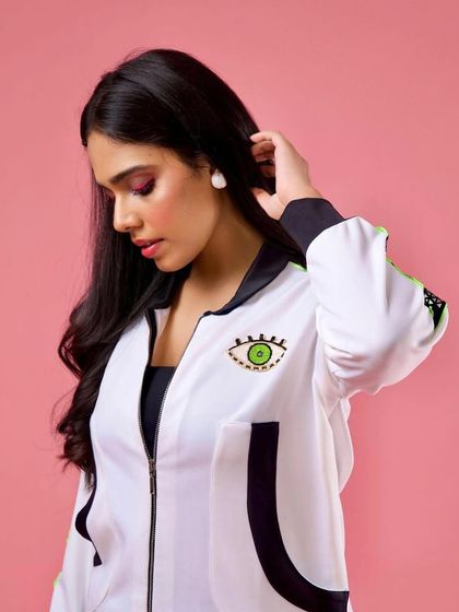 A close-up of the pink eyeshadow look. The color is blended out for a soft, diffused effect that is both bold and wearable.