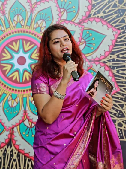 Dressed in a traditional saree for a Sangeet Sandhya, I am ready to host an evening of music, dance, and celebration. I adapt my style to fit the elegance and cultural significance of each event.