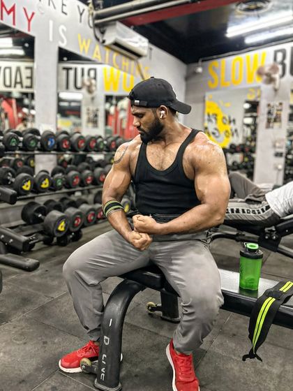 Veins and gains. A seated pose showing the vascularity in my arms. This is a sign of low body fat and good conditioning.