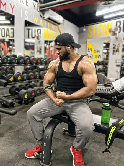 Veins and gains. A seated pose showing the vascularity in my arms. This is a sign of low body fat and good conditioning.