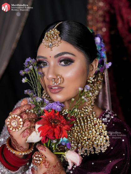 An artistic close-up that highlights the intricate details of the eye makeup and the soft texture of the skin, skills you'll develop in my advanced classes.