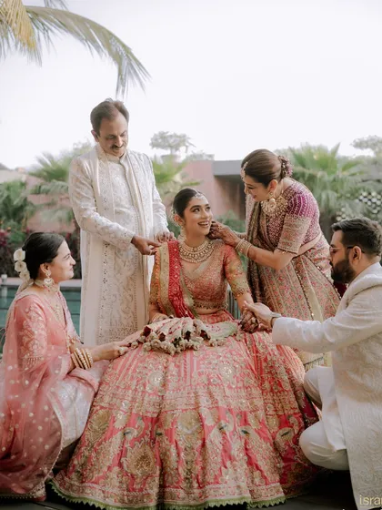The bride surrounded by the love and blessings of her entire family. We make sure to capture these important group portraits in a beautiful and meaningful way.