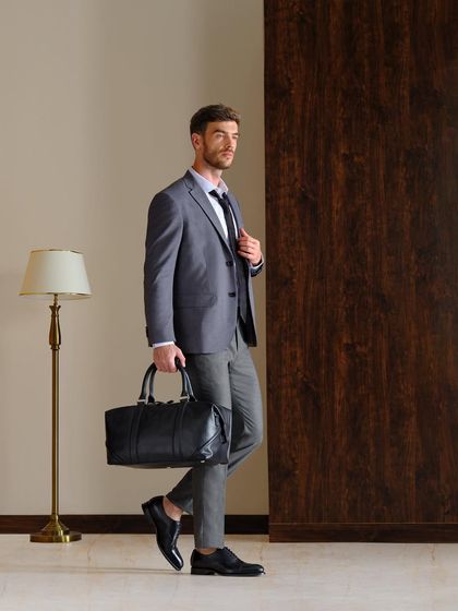 A commercial shot for Moral Code footwear, identical to 149, showcasing a classic business look. My role was to ensure the styling felt authentic and aspirational for the target consumer.