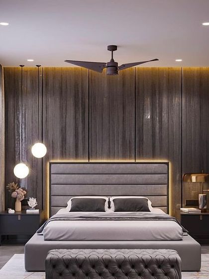 A full view of the dark and moody bedroom concept. The fluted wall, glass wardrobe, and layered lighting work together to create a sophisticated and cohesive design.