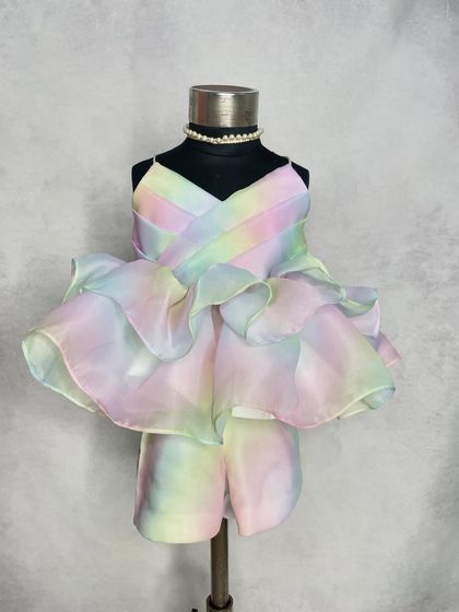 The full view of our Rainbow Co-ord set on a mannequin, showcasing the structured yet airy design of the ruffled top and the comfortable matching shorts.
