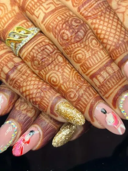 Another angle of the stunning bridal nail art, showcasing the 3D flower and hand-painted bride.