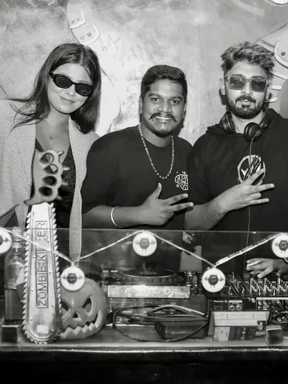 A black and white shot with the crew at Tipsy Bull.
