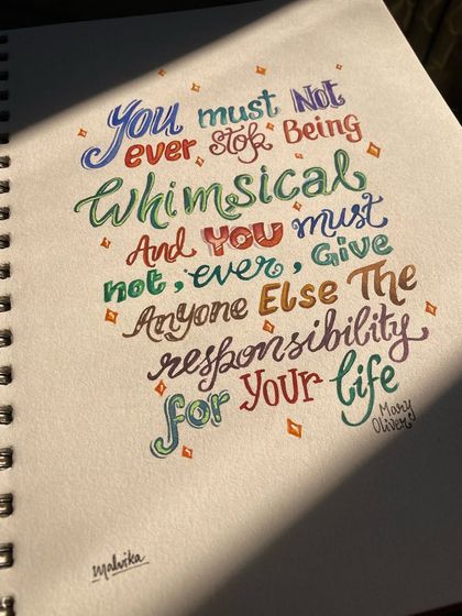 A different angle of the Mary Oliver quote, with sunlight falling across the sketchbook page. This photo captures the handmade feel of the piece and the joy of creating something with my own hands.