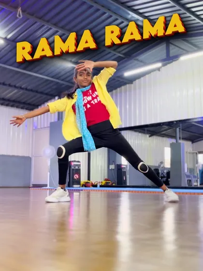 A powerful stance from our "Rama Rama" choreography. This image captures the intensity and focus we teach, blending devotion with strong, expressive dance poses.