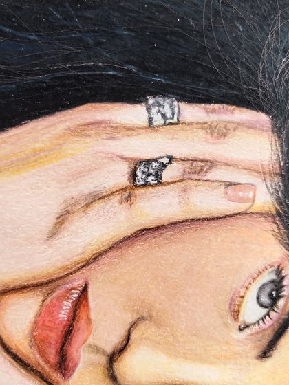 A unique, rotated close-up of the Billie Eilish portrait, focusing on the details of her rings and the texture of her skin.
