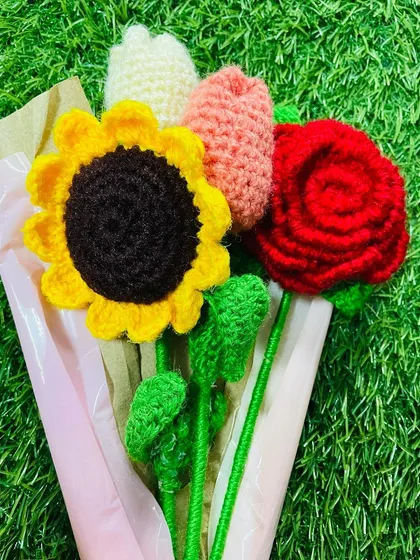 A detailed shot of the flower heads in one of my mixed bouquets. You can see the intricate patterns of the sunflower, the gentle shape of the tulips, and the layered petals of the rose.