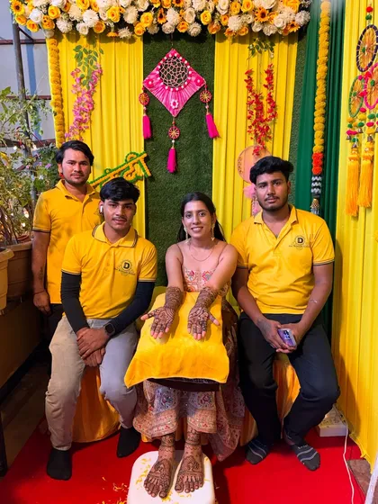 My team with a happy bride, ready for her wedding festivities with her full bridal mehndi.
