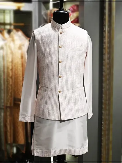 Another angle of the off-white textured Nehru jacket and kurta set, showcasing its clean and sophisticated look.