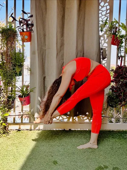 A standing forward bend variation, this pose stretches the hamstrings and opens the hips. It's a reminder to slow down and focus on your breath, which is the anchor for your energy.
